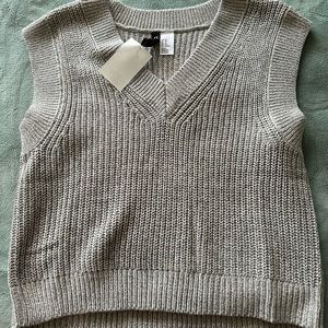 grey sweater vest